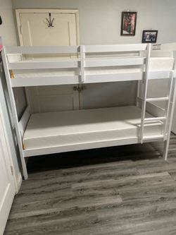 Twin bunk bed. Available in espresso, white, & grey. Bunk bed only-$299. With mattresses-$450. Assembly required. Assembly not included. Tax included.