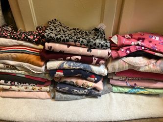Girls shirts size 10/12  14/16 different brand like old navy Disney Roxy and others. And 3 dresses
