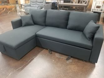 Black reversible sofa with pullout bed