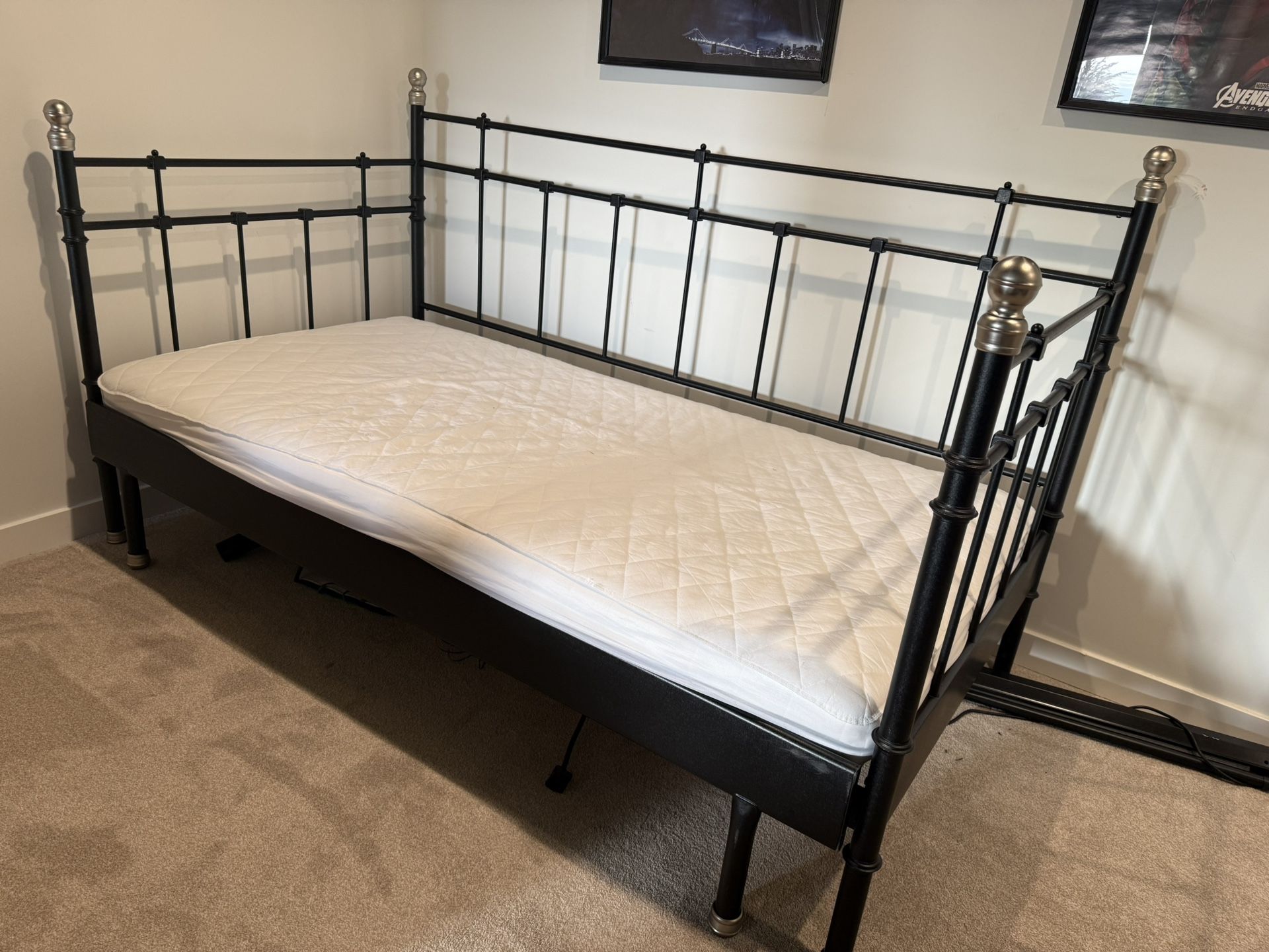 very sparingly used Day bed that extends to be a double bed