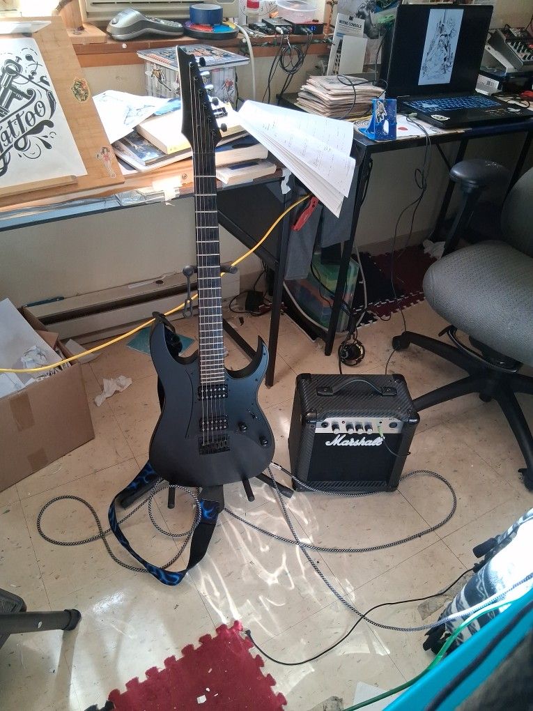 Ibenez Guitar With Marshal MG10 Amp