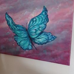 Interior Designer Remodeling:  Turquoise Butterfly  Room: ART Work.,  Deco Frame With  Butterflies, Chair, Large Two Piece  Bookcase.  Drapes, Etc. 
