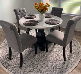 Marble dining table with chairs