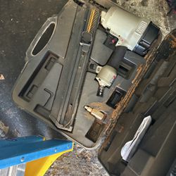 Frame Gun With Two Boxes Of Nails