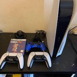 PlayStation 5 with cords controller and game
