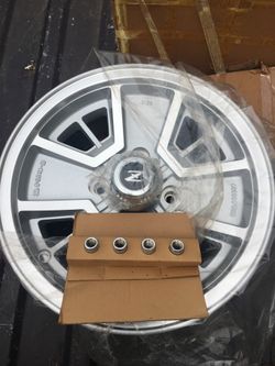 BRAND NEW 1-FACTORY NISSAN DATSUN 280-ZX 4-SPOKE ALUMINUM RIM 1979