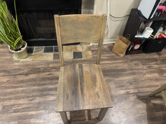 4 matching wood dining chairs