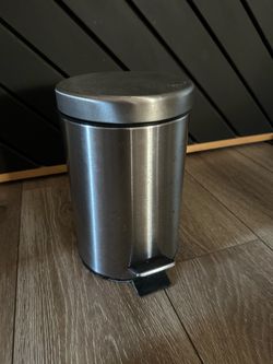 Small chrome bathroom step trash can with lid