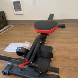 Space Saving, Adjustable Rowing Machine. Minimum Use.