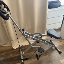 compact seated pedal exerciser / hydraulic stepper-style fitness machine 