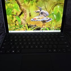 Powerful Microsoft Surface Pro. has Windows 11 and an Intel Core i7 7th Gen processor. Comes with 16GB RAM and a spacious 1TB SSD. Keyboard cover is i