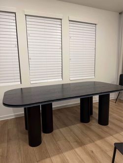 MUST GO! Black oval dining table
