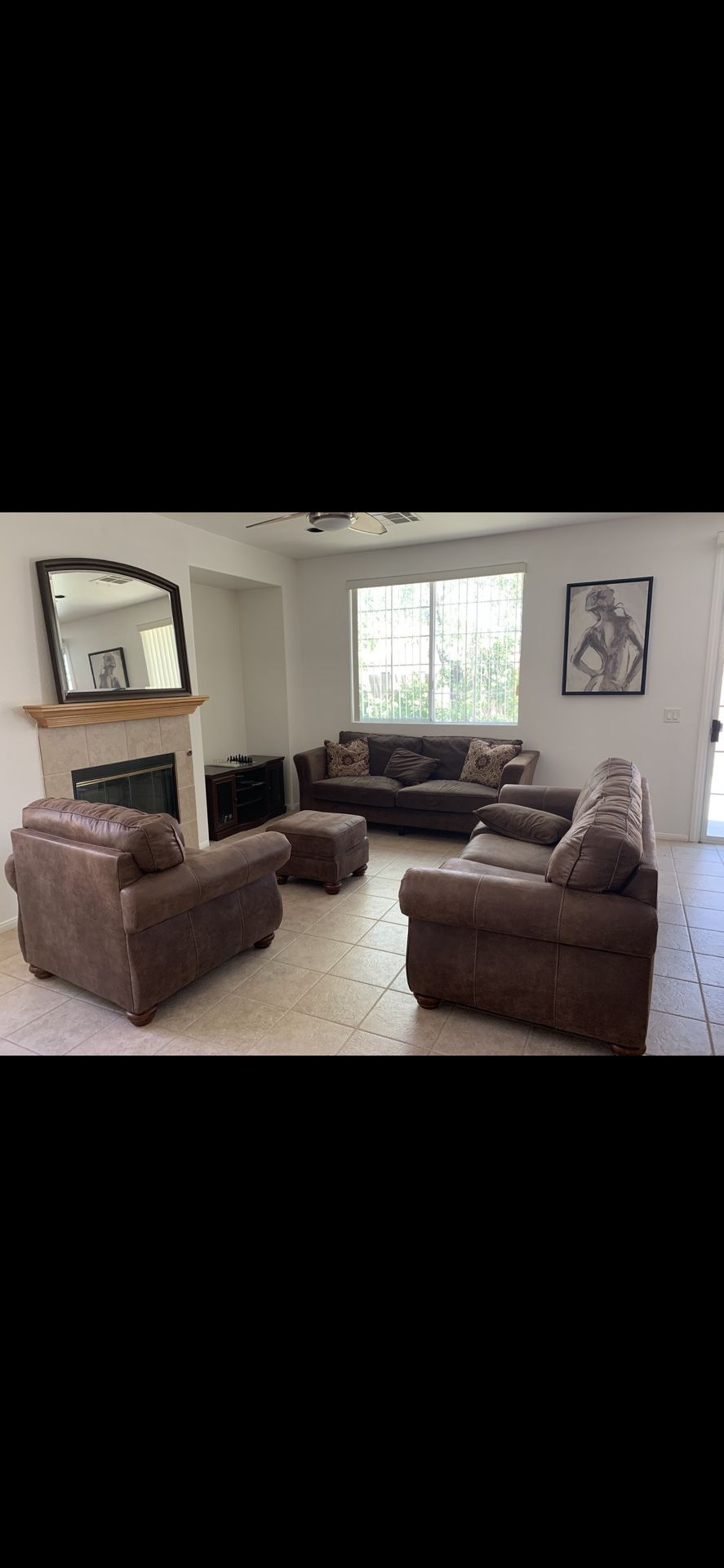 Brown Couch With An Ottoman