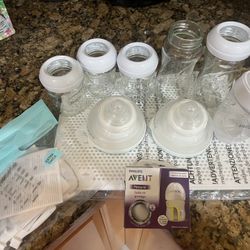 5 glass Phillips avent baby bottles, 1 playtex bottle, 2 nabobebe bottle & drying rack