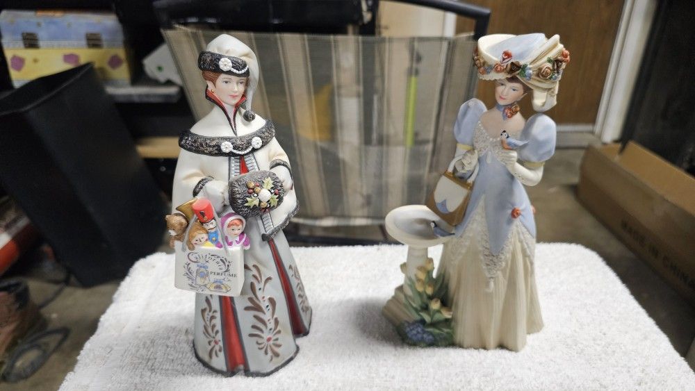 Avon President's Club Award figurines