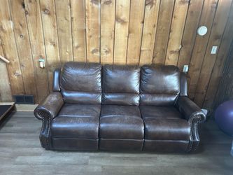 Brown Reclining Sofa and Loveseat