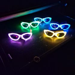 Neon. Sunglasses Needs Two AA Batteries 