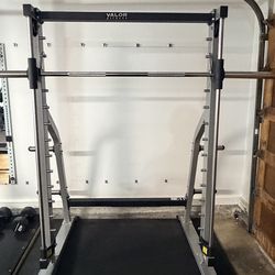 SMITH MACHINE WITH OLYMPIC STORAGE PEGS