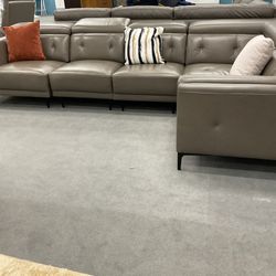 New Manual adjustable headrest 5 piece stationary sectional sofa. 