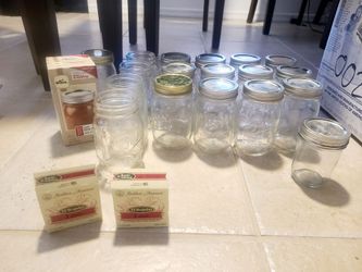 Canning supplies-- jars, lids, bands, tongs