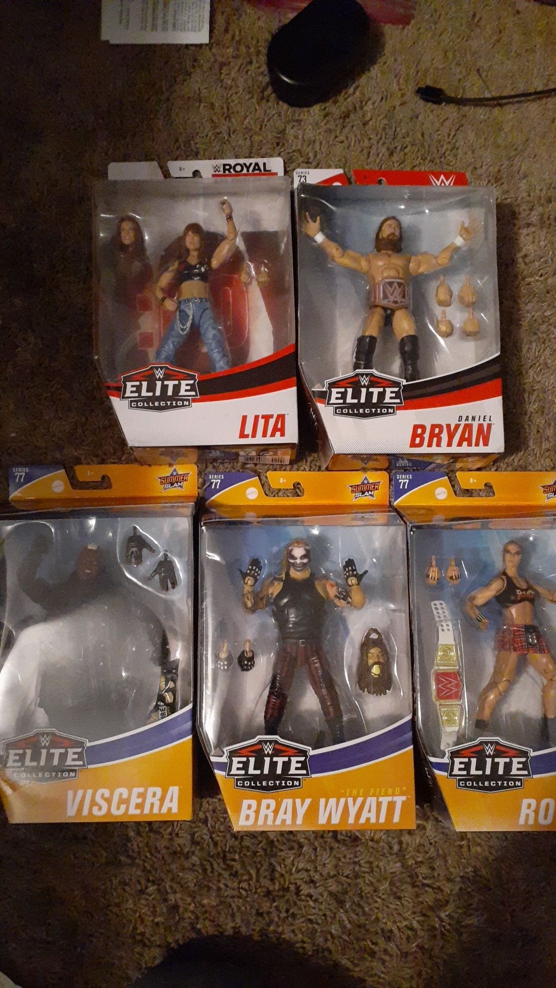 5 WWE elite figures