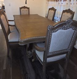 Please read. Ashley's furniture wooden dining table