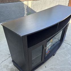 dark brown electric fireplace TV stand with a Spectrafire insert.  60inch