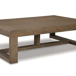 BRAND NEW IN BOX BY ASHLEY DESIGN COFFEE TABLE
