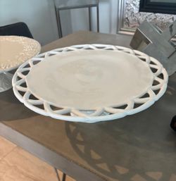 Two ivory porcelain bakery stands … 14” round & 15” round- One-William Sonoma.  $80 for both