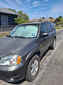 2004 Mazda Tribute (gray) Used vehicle