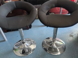 Two bar stools or glass table