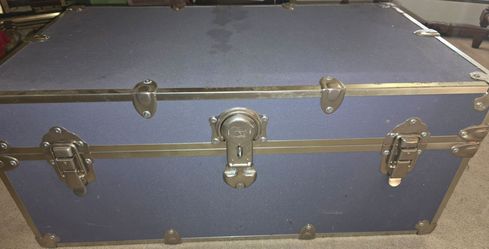 Trunk used for college but can be used for storage reorder blankets