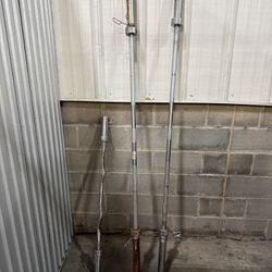 One Olympic Weight Bar With Clips And One Crimp Bar With Clips 