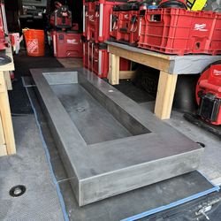 Custom concrete floating vanity sink