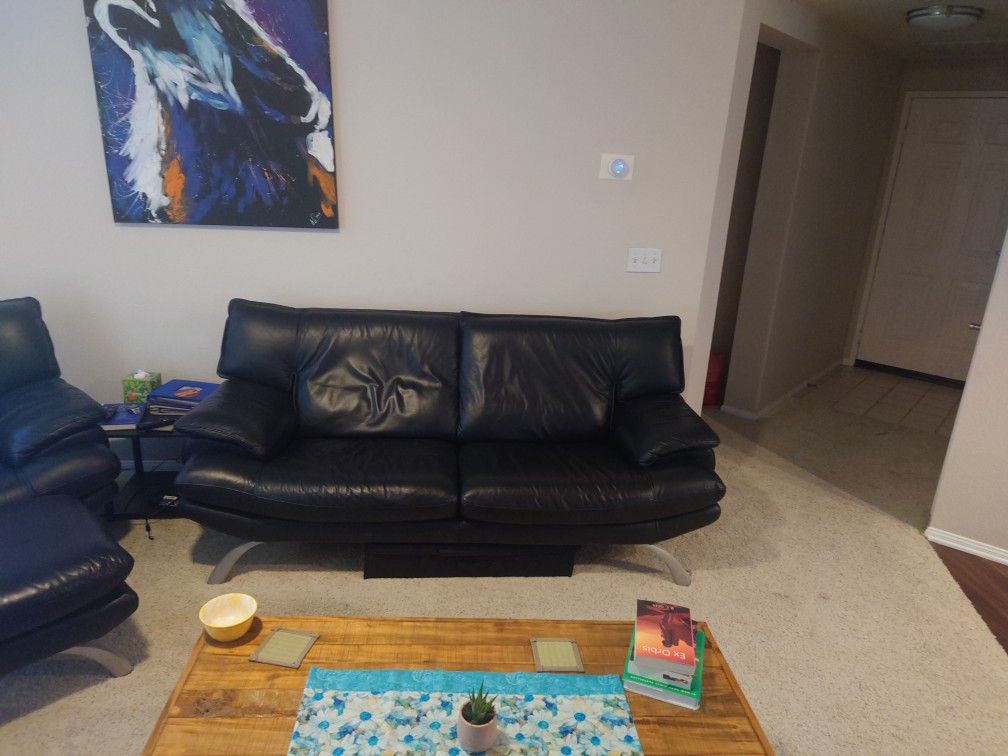 Couch And Oversized Arm Chair And Ottoman