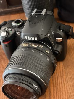 Nikon D 60 with amazing lenses brand new lithium, batteries, and charger