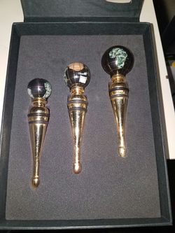 Globe wine stoppers