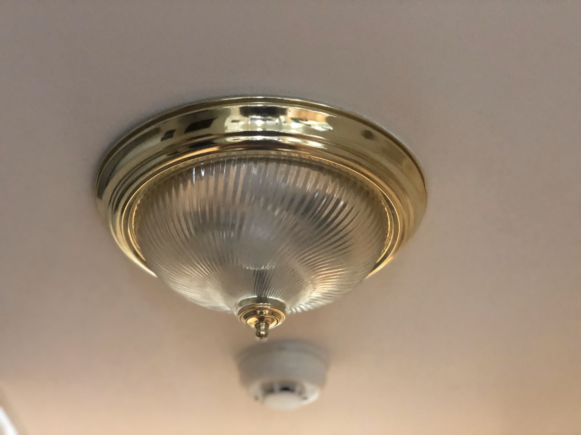 Brass ceiling light fixture with glass