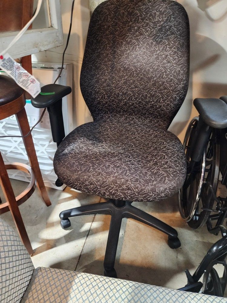 Home Furnishings office chair with adjustable height seat and arms. 
