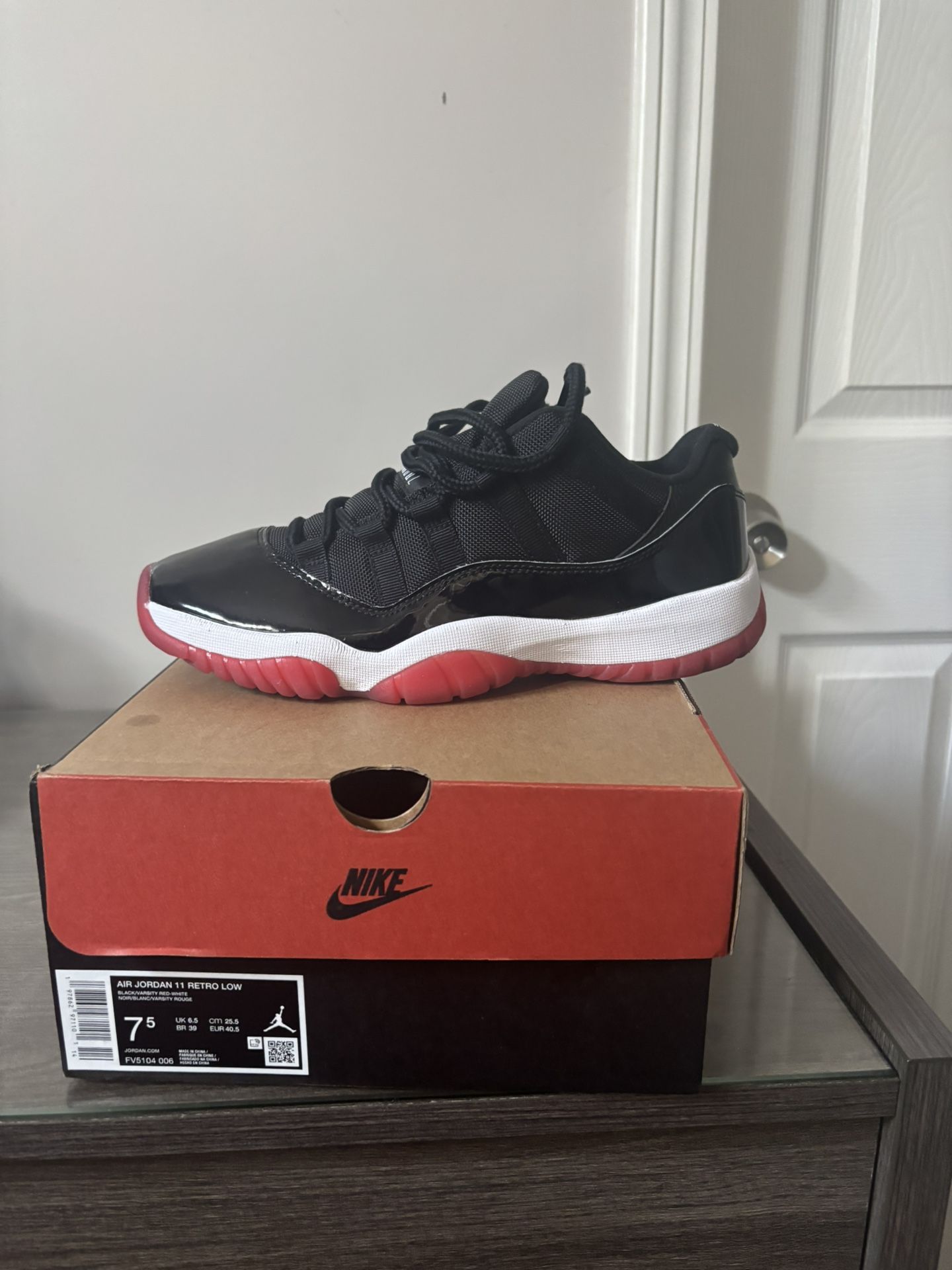 Air Jordan Size 7 1/2 Black ,Red , White