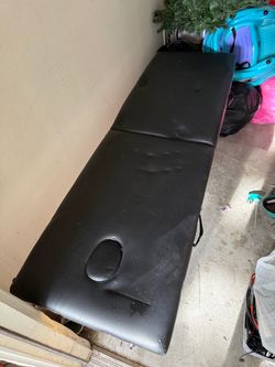 Massage table