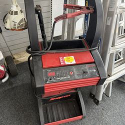 Snap on battery charger 