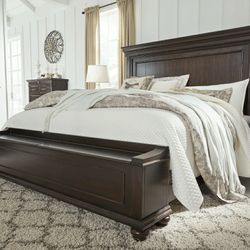 Brynhurst Dark Brown King Panel Storage Bed

