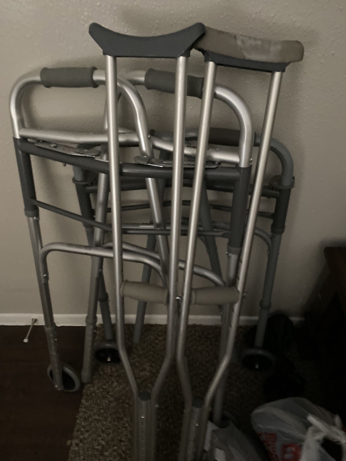 1 Set Of Crutches And 2 Walkers 