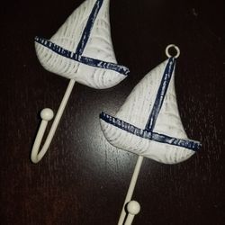 2 wall sailboat hooks 