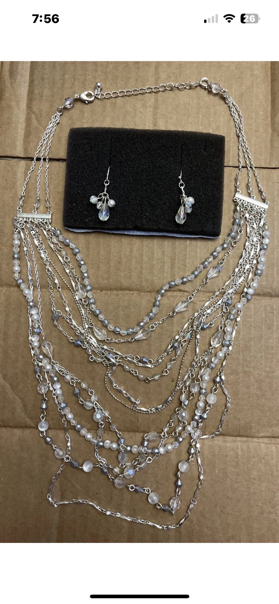 Silver Toned And Beaded Multistrand Necklace And Earring Set.