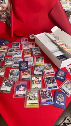 ONE PIECE  card collection, holograms and hard top loaders and giant box. Check it out.