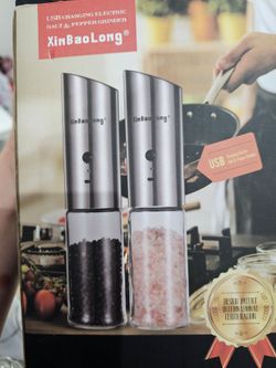 Brand new still in the box electric salt and pepper grinders.
