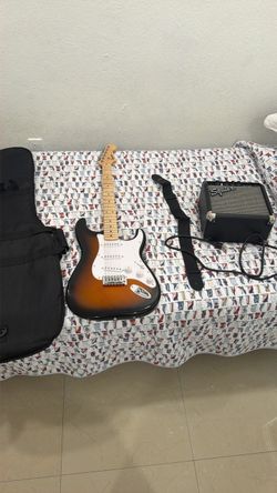 Electric guitar set (Squier Stratocaster-style guitar)