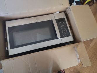 stainless steel over-the-range microwave oven.